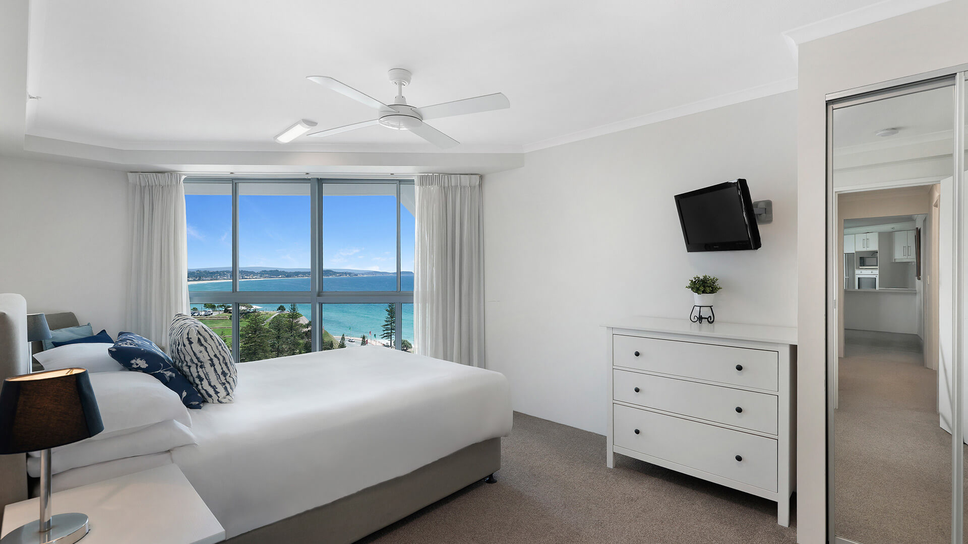 Main bedroom with ocean views in the Superior 1 Bedroom Ocean View Apartment at ULTIQA Points North.