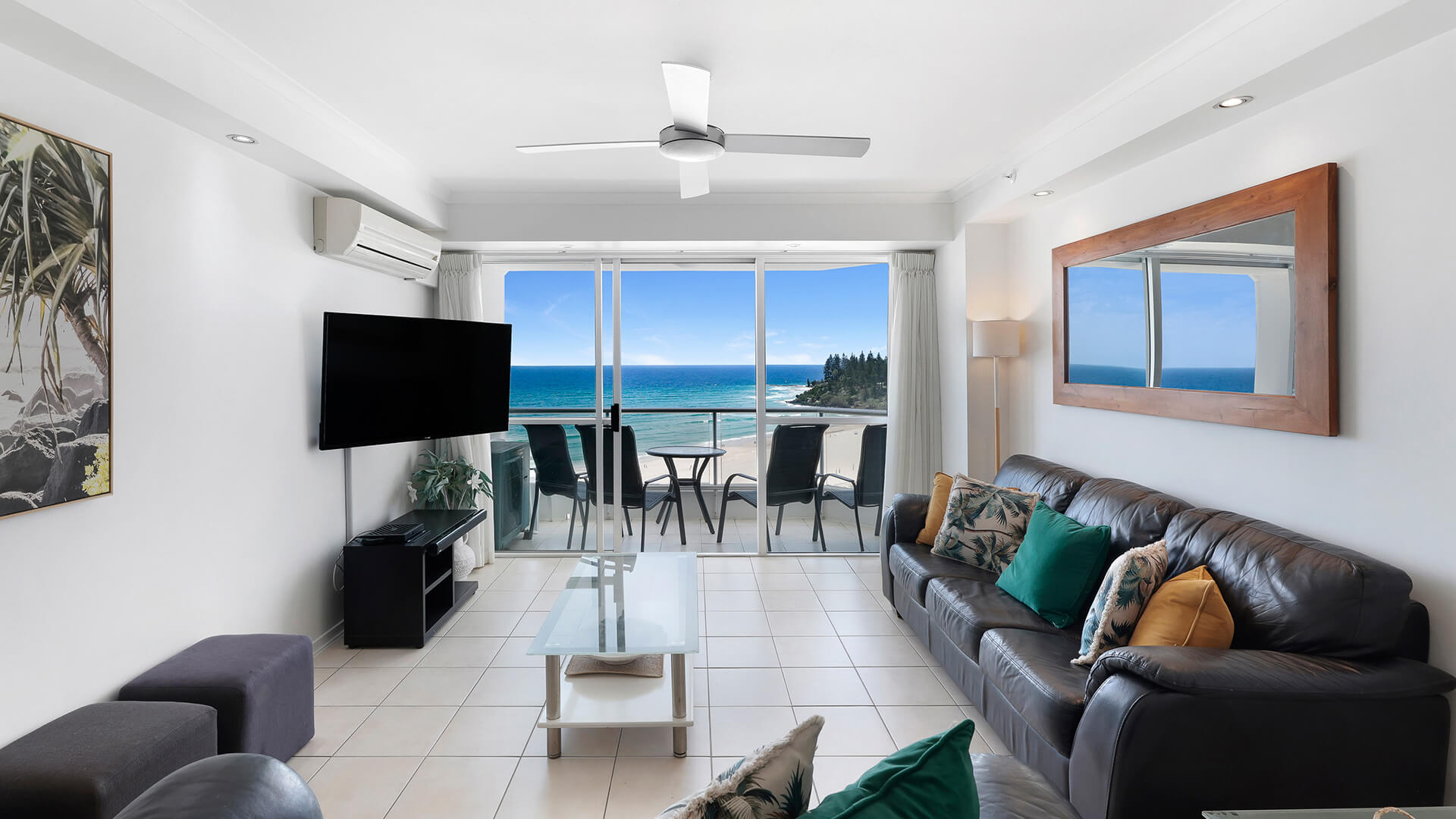 Spacious oceanfront lounge area with furnished patio & Ocean Views in the Superior 1 Bedroom Ocean View Apartment at ULTIQA Points North.