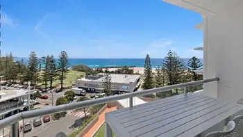 Balcony view from the Standard 2 Bedroom Centre Front Apartment at ULTIQA Points North, overlooking Coolangatta Beach and the surf club.